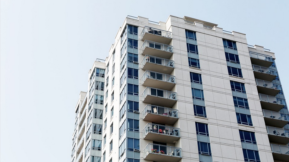 a building made of condos